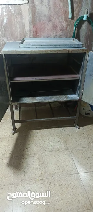 فرن غاز تفصيل جديد استخدام مره واحده طنجرة الضغط نوعها السيف الاصليه غير مستعمله و مايكرويف نوع