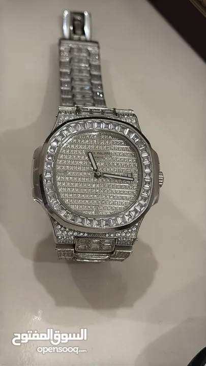 patek philippe nautilus  iced automatic