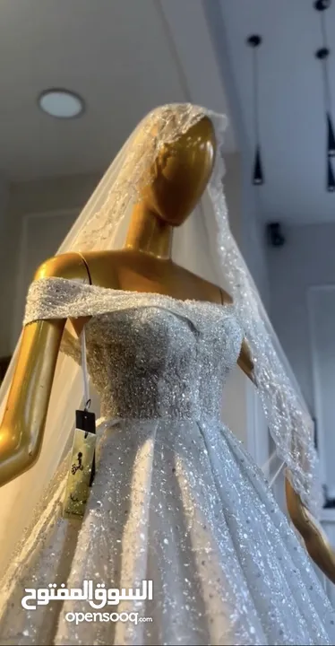 فستان زفاف ايفوري