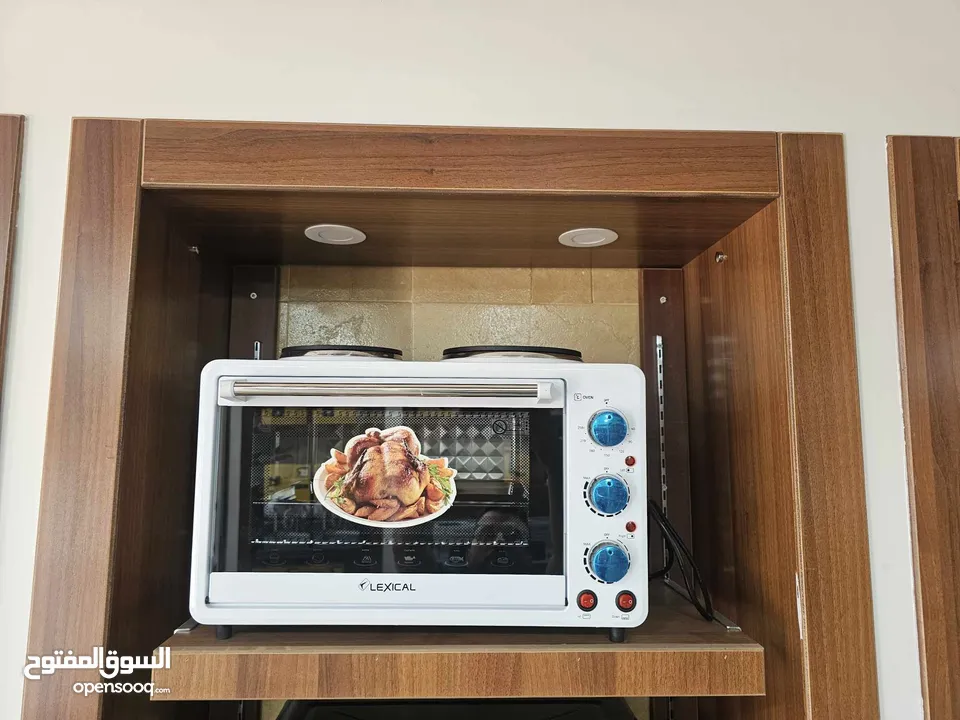 فرن مع غاز كهربائي