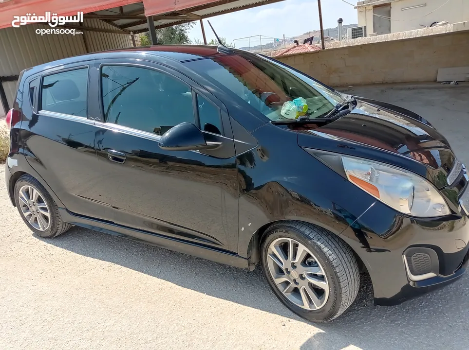 شفروليه سبارك كهرباء كامل2015 كرت ابيض فحص كامل تمشي بشحنه 140كيلو  قابل للتفاوض