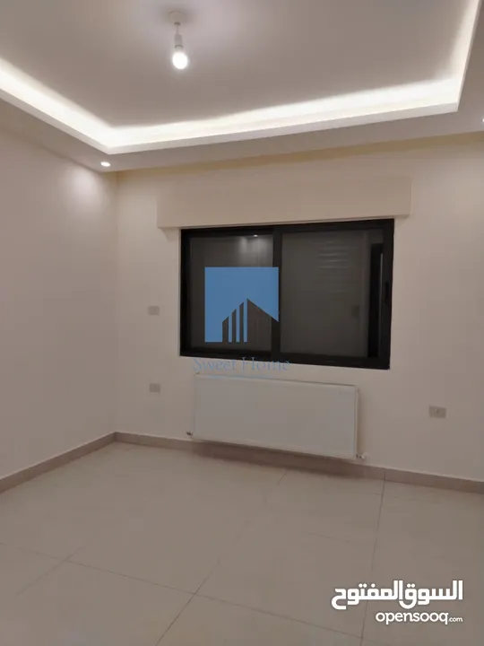 شقة أرضية فاخرة للبيع في خلدا - قرب إشارة الدر المنثور 140م مع حديقة وترسات 70م لم تسكن