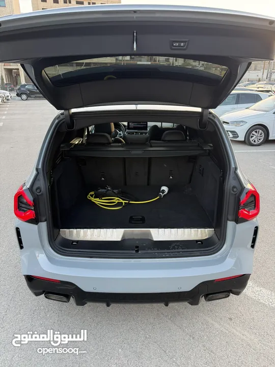 BMW x3 30e ترخيص 2022 ترخيص  محرك 2000 هايبرد plug in/يقطع على الشحنه 30 كيلو متر  293 حصان