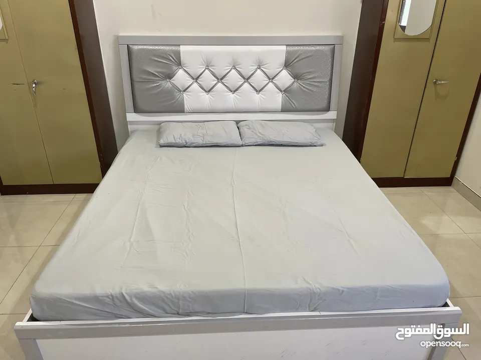 King size bed with mattress and pillows- 600 SAR