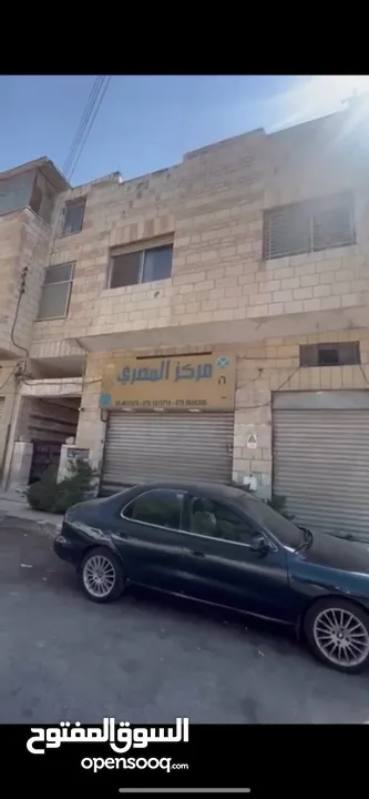 فرصة إستثمارية عمارة تجاري طابقين للبيع - جبل الحسين بالقرب من موقع جبل القلعة الأثري