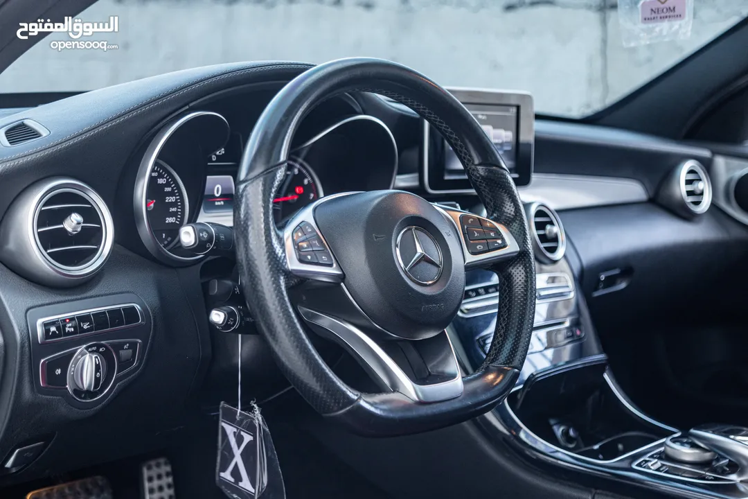 Mercedes C200 Amg kit 2015 مميزة جدا،  وارد و بحالة الوكالة