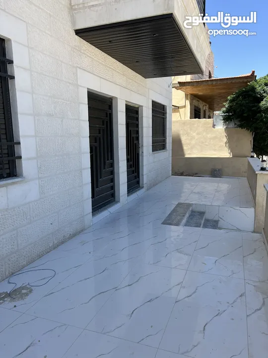 عمارة للبيع أربع شقق طابقية مساحة الشقة 148 متر في ماركا الشمالية قرية خالد بن الوليد