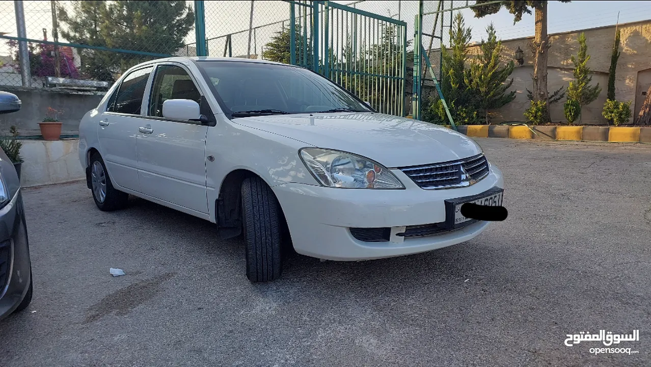 لانسر ابيض 2013