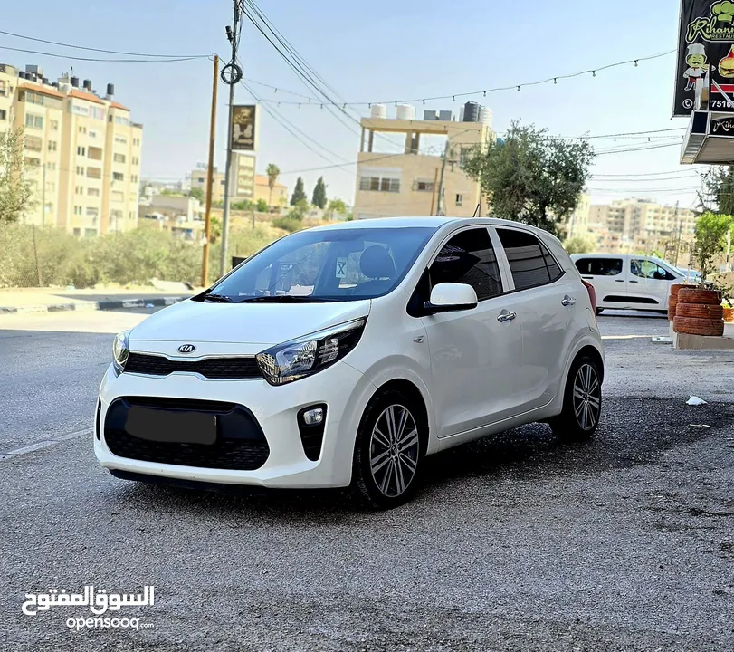 kia morning فل اضافات ما عدى فتحة