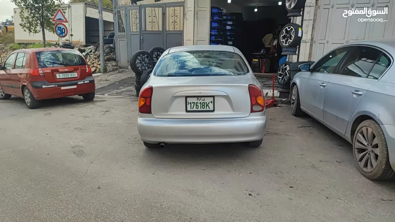 سيارة دايو لانوس اوتوماتيك موضيل 2002 متور 1.6 مرخصة مأمنة ، السيارة لعبة