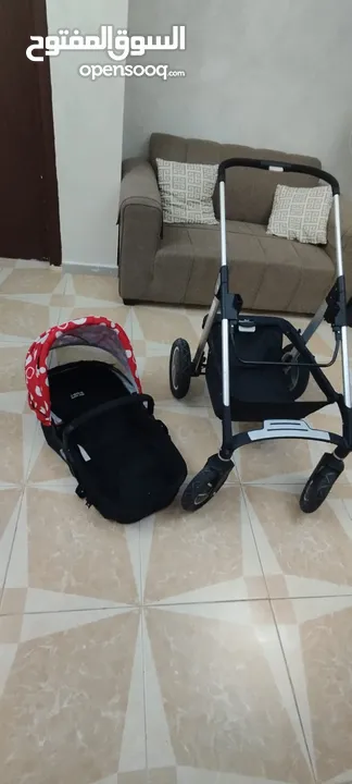 عرباية اطفال شبه جديدة للبيع وتنفع كمان كوت