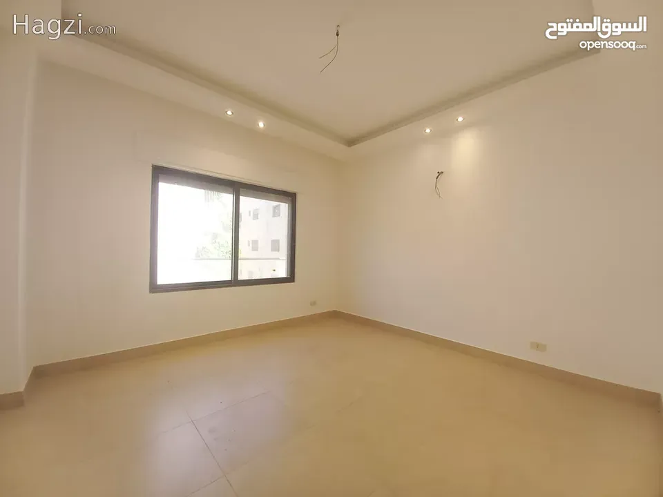 شقة مع روف غير مفروشة للايجار في عبدون  ( Property 34122 ) سنوي فقط