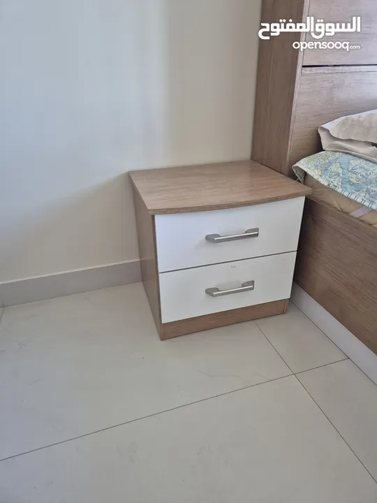 Bed + side table + chest of drawers