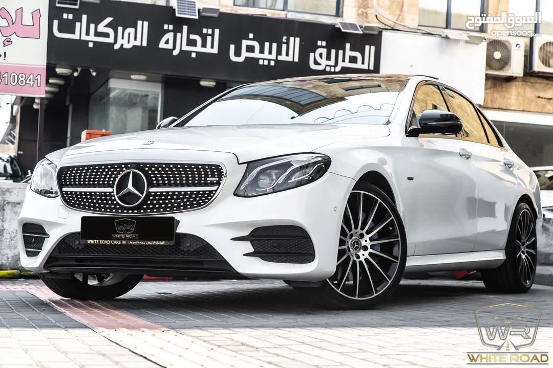 Mercedes E350e Plug in hybrid Amg kit Night Package 2018   السيارة وارد الشركة و قطعت مسافة 50,000