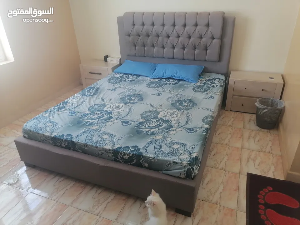 Queen size bed with raha matress and side tables