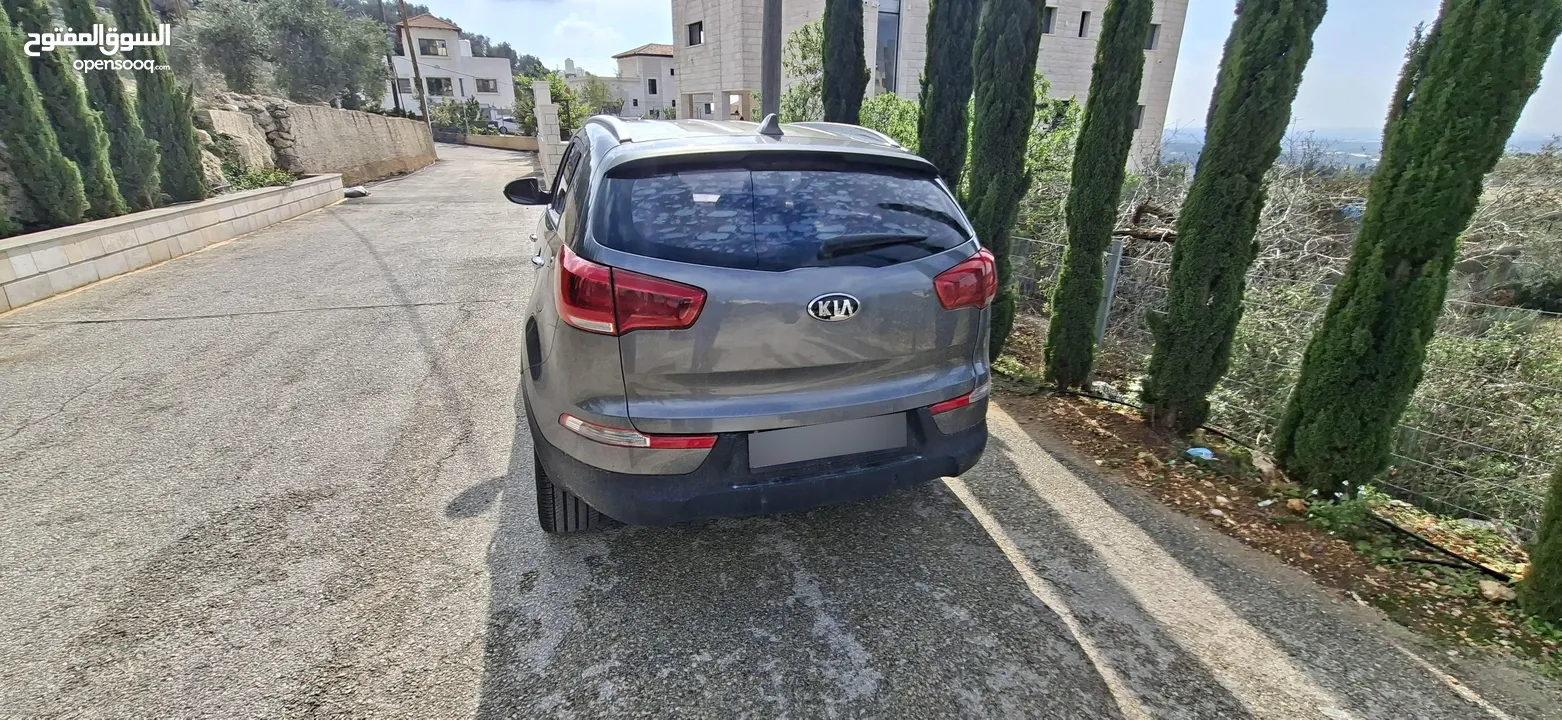 جيب كاياسبورتاج موديل 2014-اتومتيك'دفع 4×4 ماتور 2000ديزل فل فل اضافات ماعد الفتحة - نظيف من الاخر