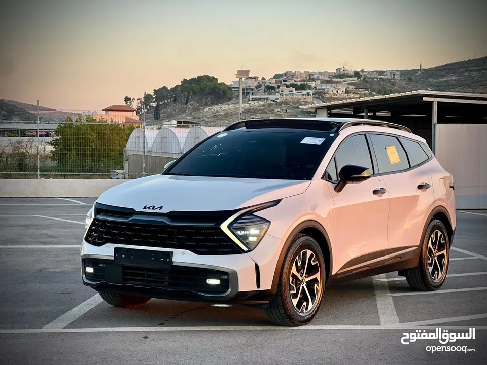 كايا سبورتاج /2022 فل الفل فتحة سقف  2x4 ///240Hp بنزين + كهرباء  ( Haybrid) 1600cc