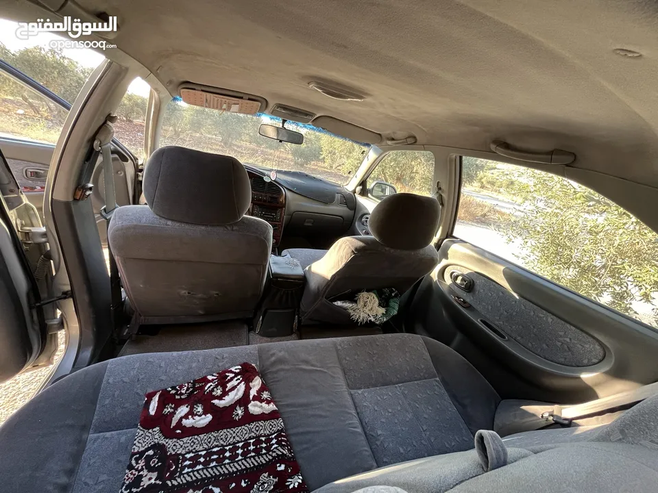 كيا سبكترا 2001 Mr اعلى صنف جير عادي للبيع  مرخصة سنة كاملة ماتور 1500cc  كوشوك جديد