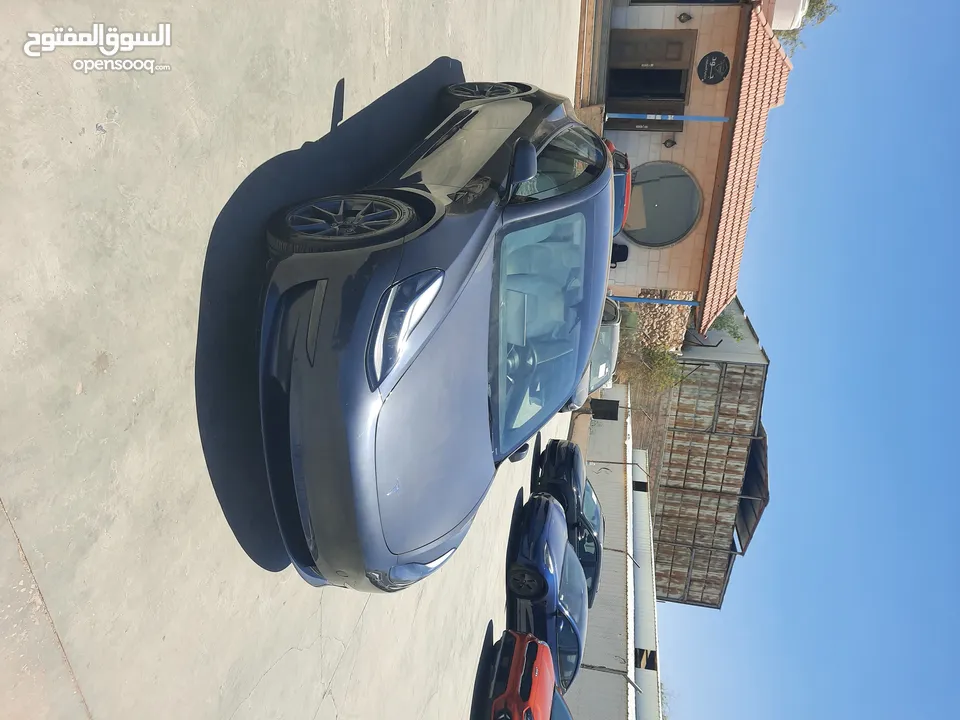 تيسلا موديل 3 موديل 2023 لون فيراني داخل ابيض عداد قليل بسعر مناسب