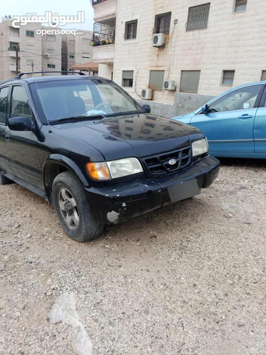 كيا سبورتج 2001 لون اسود للبيع