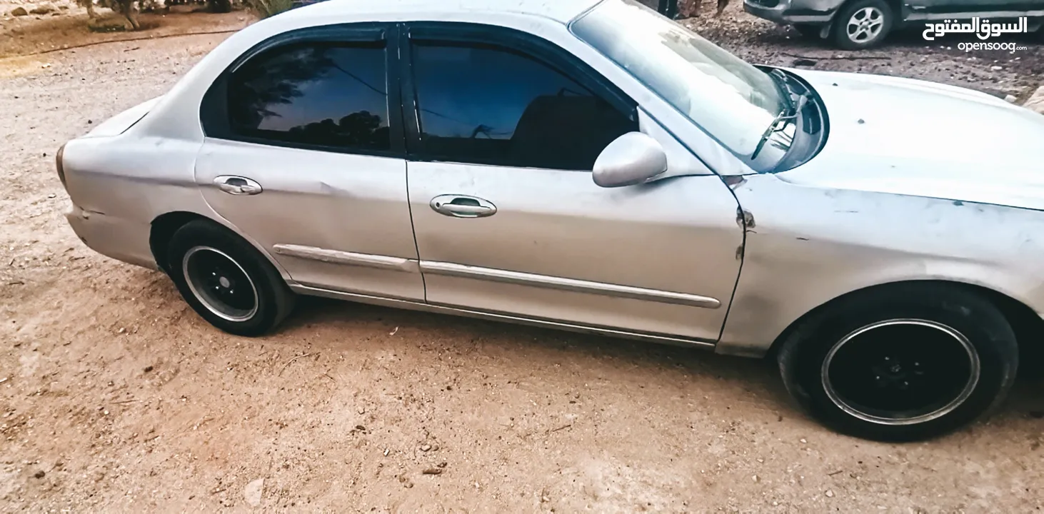 سوناتا اتوماتيك 2000 محدث 2003 فل ميكانيك ولا طقة وكهرباء ممتاز ومشية صلاة على النبي 1400 دينار قابل