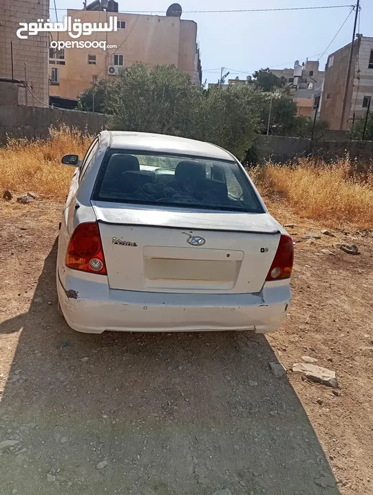 سيارة هونداي فيرنا 2003ميكانيكيات جيدة جدا وعيوب بسيطة بالبودي