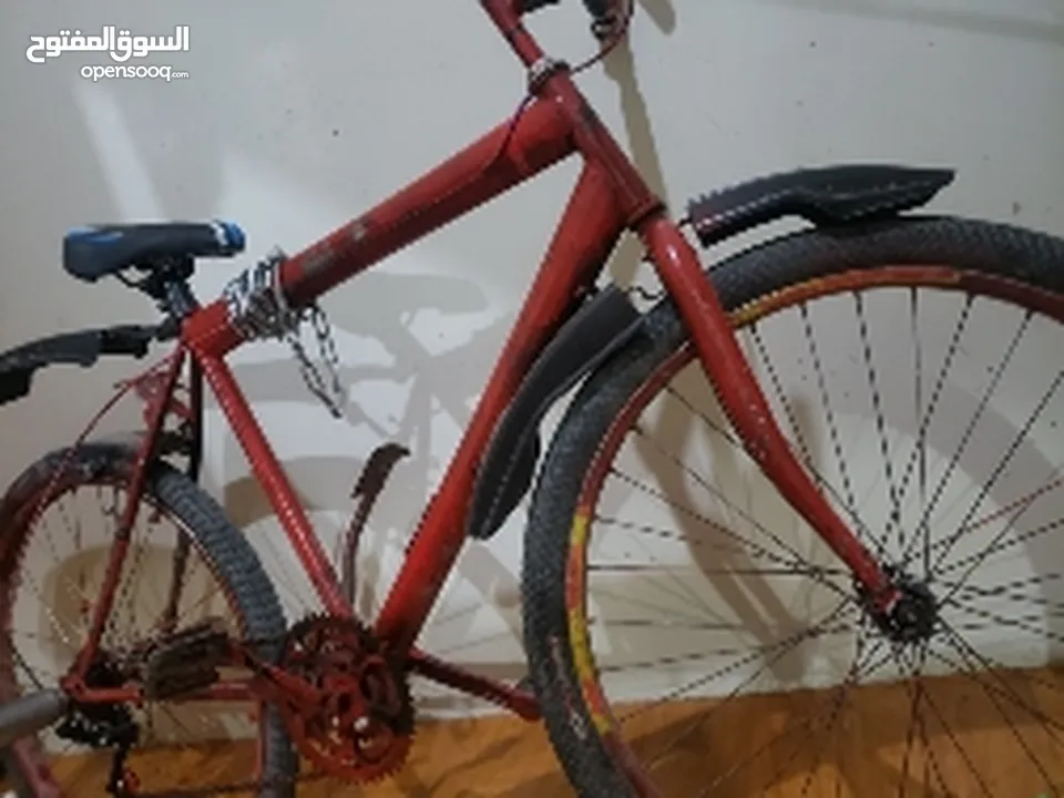 دراجة هوائية تعاشيق احمر الاصلي