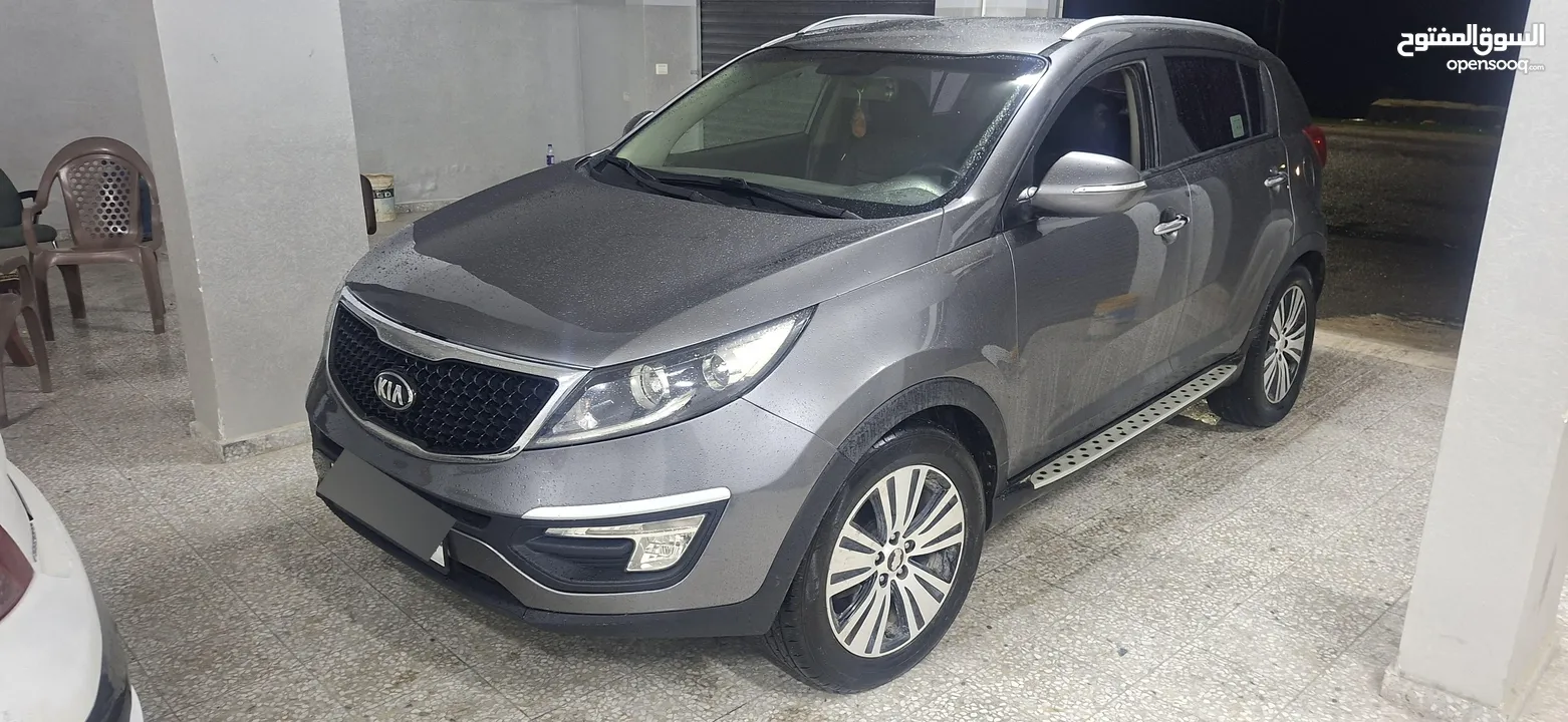 جيب كاياسبورتاج موديل 2014-اتومتيك'دفع 4×4 ماتور 2000ديزل فل فل اضافات ماعد الفتحة - نظيف من الاخر