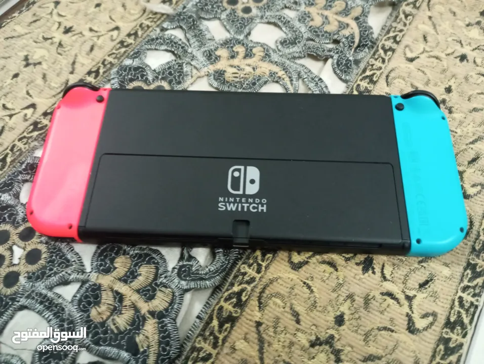 نينتندو سويتش Oled بحالة ممتازة Nintendo switch Oled