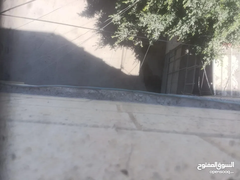 عمارة لبيع بالقرب من البنك العربي الشارع الرئيسي