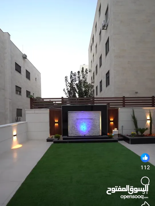 شقة شبه أرضي مع حديقة وكراج مستقل بأجمل مواقع ضاحية الرشيد