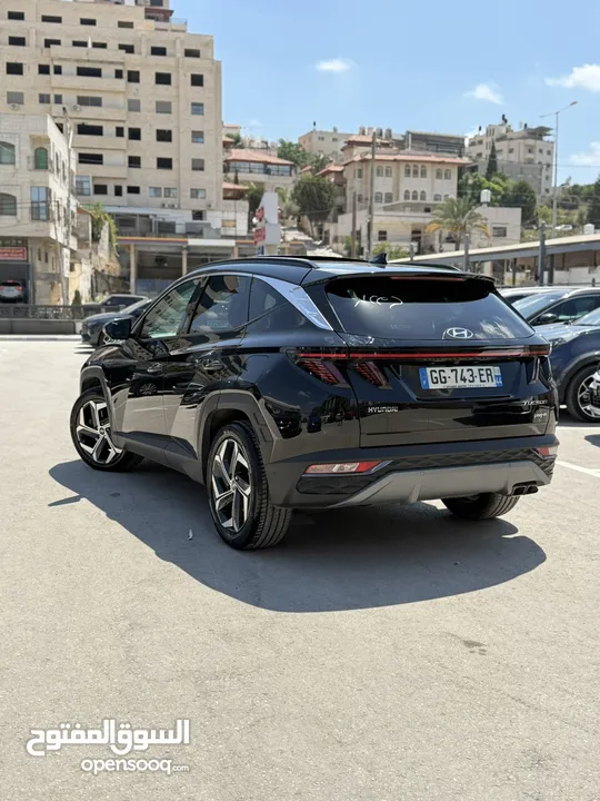 هونداي توسان ترخيص 2022 محرك 1600 هايبرد plug in/يقطع على الشحنه 52 كيلو متر