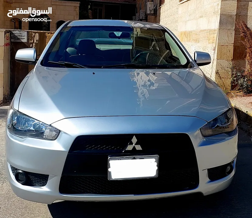 ميتسوبيشي لانسر 2014 بحال الوكالة