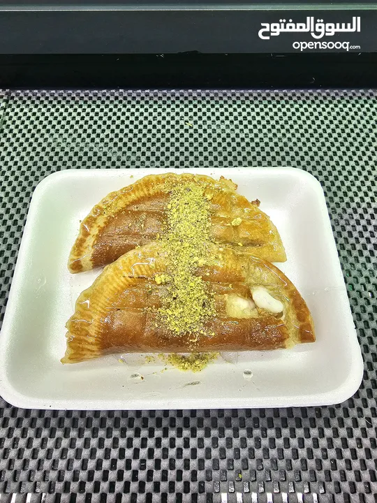 محل كنافه مجهز للبيع على الفحم وعلى الغاز