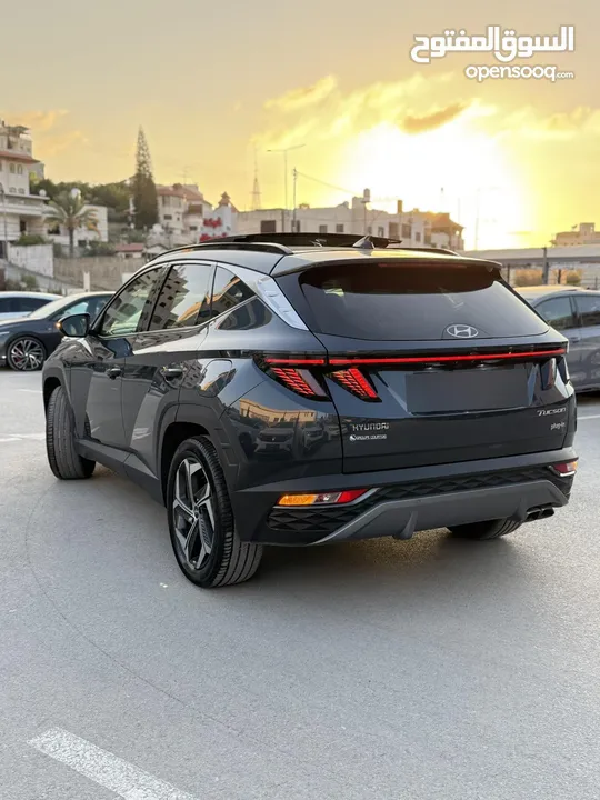 هونداي توسان ترخيص 2022 محرك 1600 هايبرد plug in/يقطع على الشحنه 65 كيلو متر  271 حصان