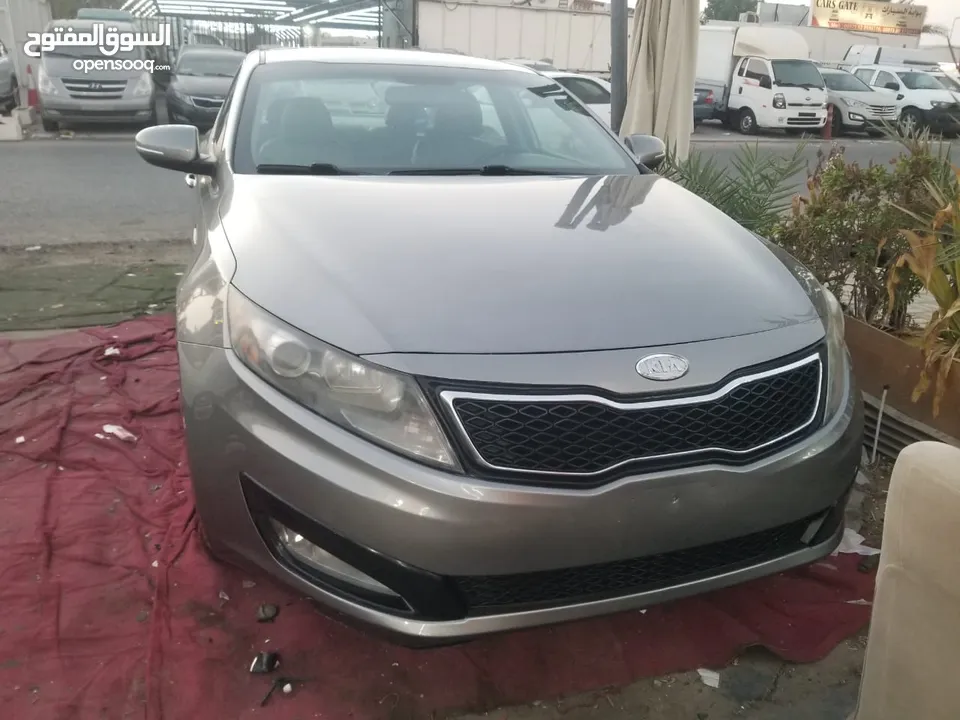 Kia optima 2012 model, leather seat so many  option and beautiful colour like new car .