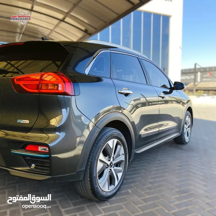 كيا نيرو كهرباء موديل 2022 لون فيراني مع فتحة وارد كوري فحص كامل