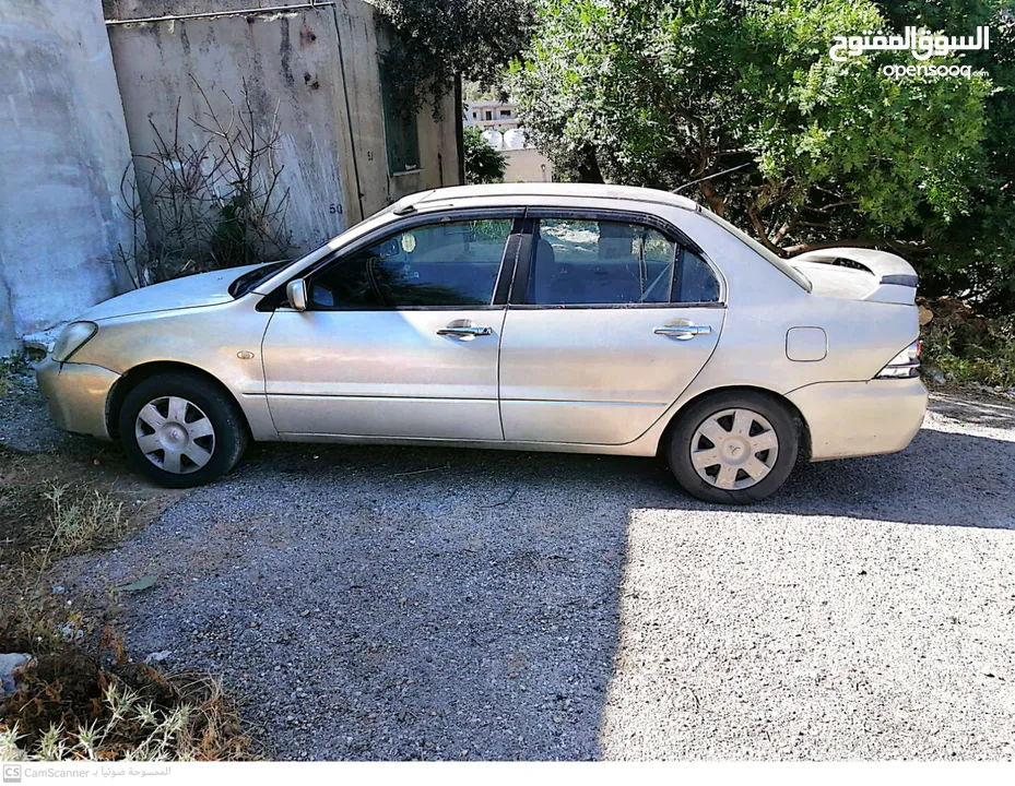 لانسر اتوماتيك 2005 شمباني