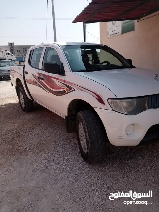 بك اب متسوبيشي   l200 موديل 2009 فور ويل 4X4