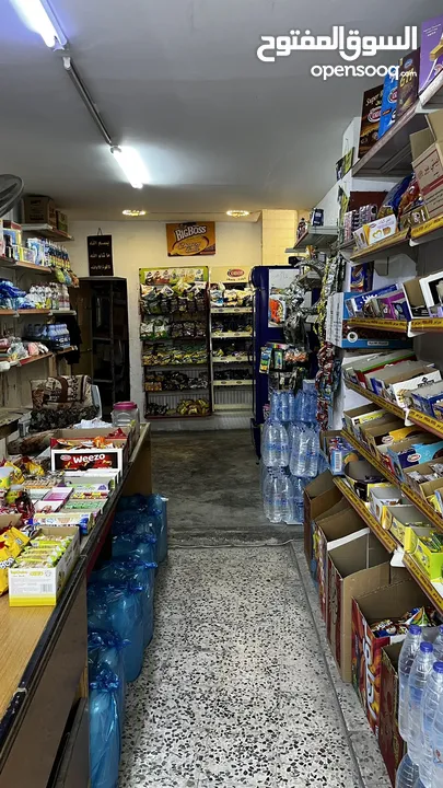 سوبر ماركت على الشارع الرئيسي في جبل الجوفة للبيع خلو