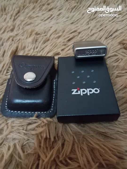 قداحة وولاعة Zippo lighter USA الامريكية الاصلية مستعملة بحالة ممتازة شبه جديدة  مع حافظة جلد اصلي .