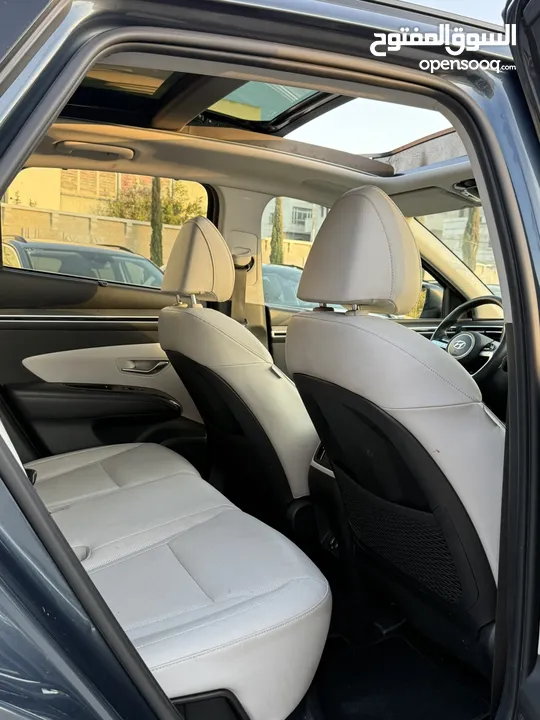 هونداي توسان ترخيص 2022 محرك 1600 هايبرد plug in/يقطع على الشحنه 65 كيلو متر  271 حصان