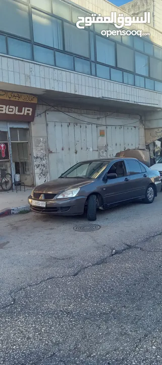 متسوبيشي لانسر جير عادي
