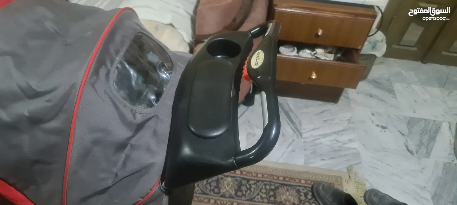 عرباية أطفال قوية ومتينة وشبه جديديدة استعمال قليل وماركة GOODbabY وبحالة ممتازة