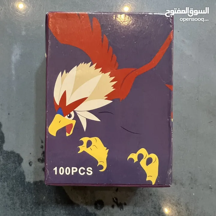 كروت بوكيمون والبومات (Pokemon cards and binders)