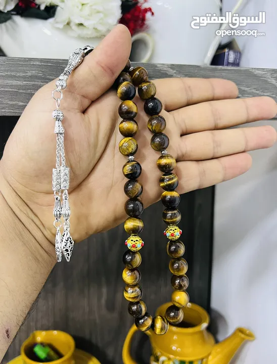 عرض خاص سبحه عين النمر ازرق او ذهبي بسعر حرق 33 حبة حلوة مش صغيرة للعلم مع طقم انتيومون مرتب