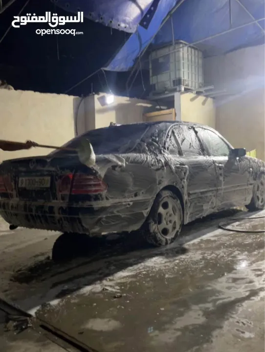 مرسيدس W210