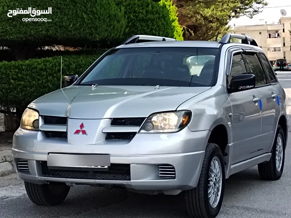 ميتسوبيشي آوتلاندر اوتوماتيك 2003 توب نظافة بسعرررر مميززز محرك 2400cc