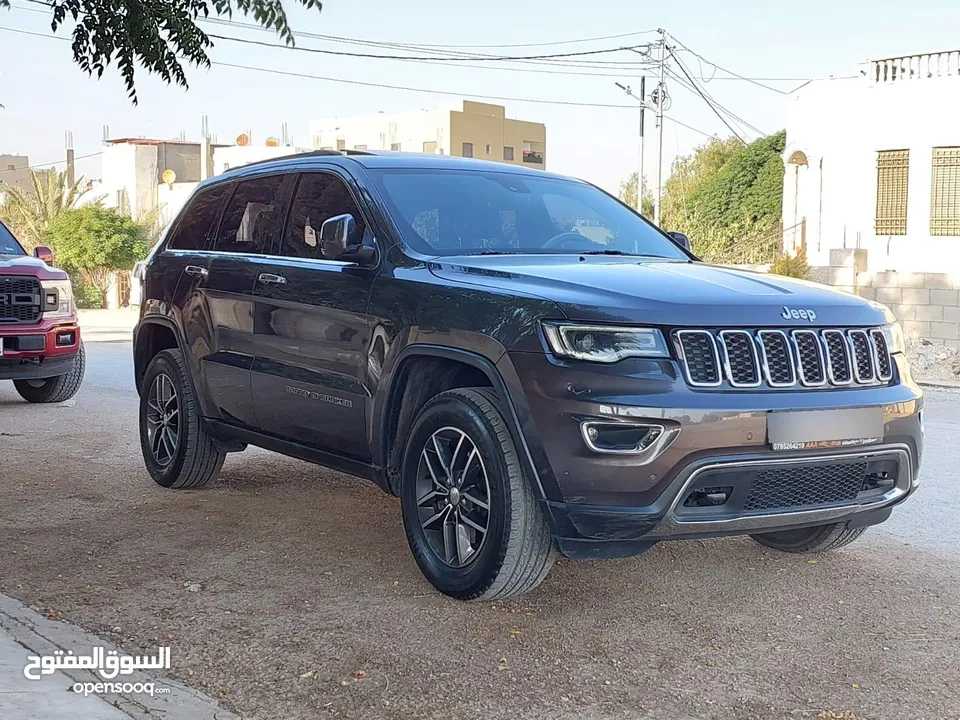 جيب جراند شيروكي فل الفل اعلى فئة بانوراما 2014 فحص كامل لون فيراني مميز بسعر مغري قابل للبدل والاقص