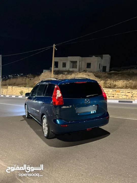 مازدا 5 جير عادي 6+1 متور 2000 بنزين رخصه و تامين جديد  عداد قليل فحص نخبب سعرر كااششش